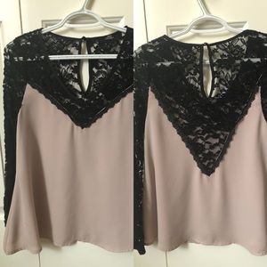 Cute blouse! Runs a little big.